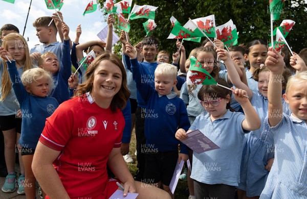 150725 - Wales Women Women’s Rugby World Cup 2025 Kit Launch, National Botanical Gardens of Wales - Kate Williams with schoolchildren at the launch of the Wales Women’s Rugby World Cup kit at the National Botanical Gardens of Wales