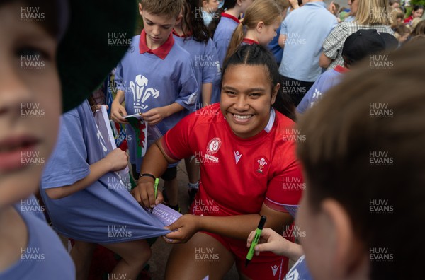 150725 - Wales Women Women’s Rugby World Cup 2025 Kit Launch, National Botanical Gardens of Wales - Sisilia Tuipulotu with schoolchildren at the launch of the Wales Women’s Rugby World Cup kit at the National Botanical Gardens of Wales