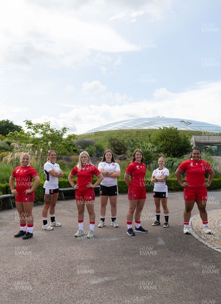 150725 - Wales Women Women’s Rugby World Cup 2025 Kit Launch, National Botanical Gardens of Wales - Wales players, left to right, Molly Reardon, Georgia Evans, Alex Callender, Maisie Davies, Kate Williams, Keira Bevan and Sisilia Tuipulotu at the launch of the Wales Women’s Rugby World Cup kit at the National Botanical Gardens of Wales