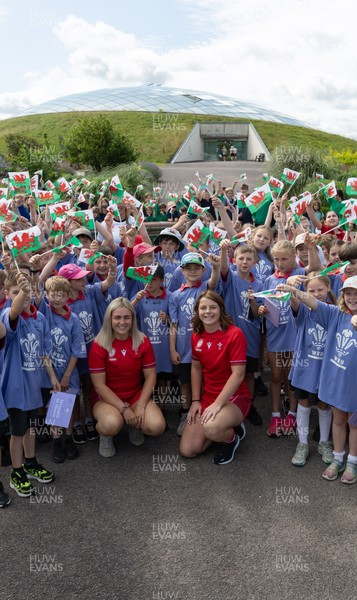 150725 - Wales Women Women’s Rugby World Cup 2025 Kit Launch, National Botanical Gardens of Wales - Wales players, join with schoolchildren at the launch of the Wales Women’s Rugby World Cup kit at the National Botanical Gardens of Wales
