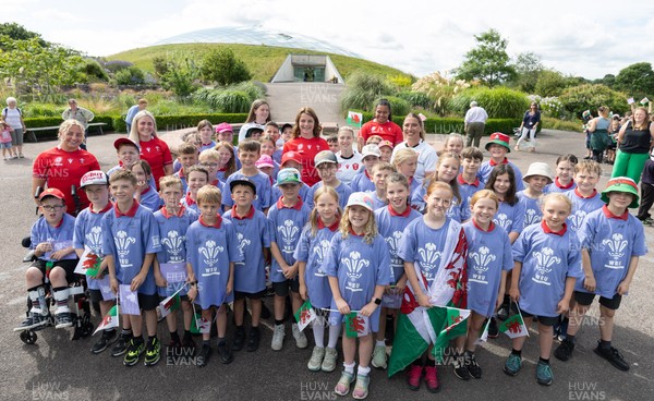 150725 - Wales Women Women’s Rugby World Cup 2025 Kit Launch, National Botanical Gardens of Wales - Wales players, join with schoolchildren at the launch of the Wales Women’s Rugby World Cup kit at the National Botanical Gardens of Wales