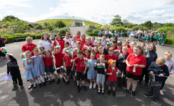 150725 - Wales Women Women’s Rugby World Cup 2025 Kit Launch, National Botanical Gardens of Wales - Wales players, join with schoolchildren at the launch of the Wales Women’s Rugby World Cup kit at the National Botanical Gardens of Wales