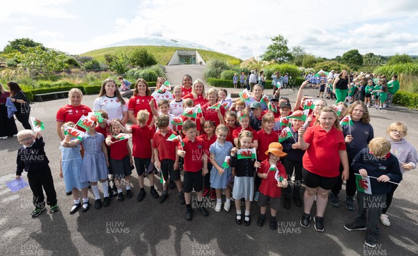 150725 - Wales Women Women’s Rugby World Cup 2025 Kit Launch, National Botanical Gardens of Wales - Wales players, join with schoolchildren at the launch of the Wales Women’s Rugby World Cup kit at the National Botanical Gardens of Wales