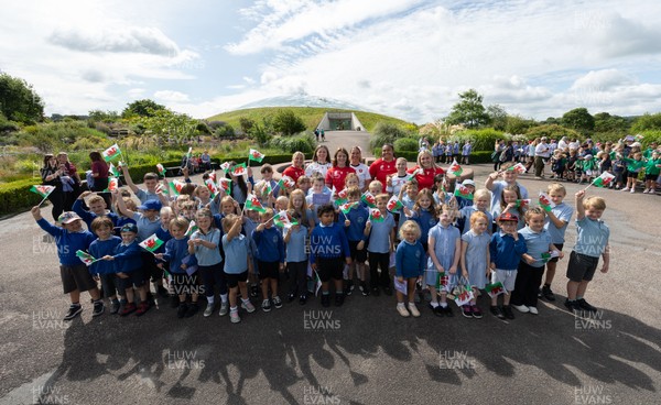 150725 - Wales Women Women’s Rugby World Cup 2025 Kit Launch, National Botanical Gardens of Wales - Wales players, join with schoolchildren at the launch of the Wales Women’s Rugby World Cup kit at the National Botanical Gardens of Wales