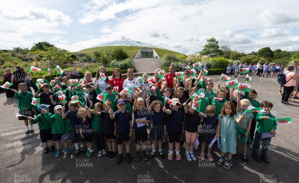 150725 - Wales Women Women’s Rugby World Cup 2025 Kit Launch, National Botanical Gardens of Wales - Wales players, join with schoolchildren at the launch of the Wales Women’s Rugby World Cup kit at the National Botanical Gardens of Wales
