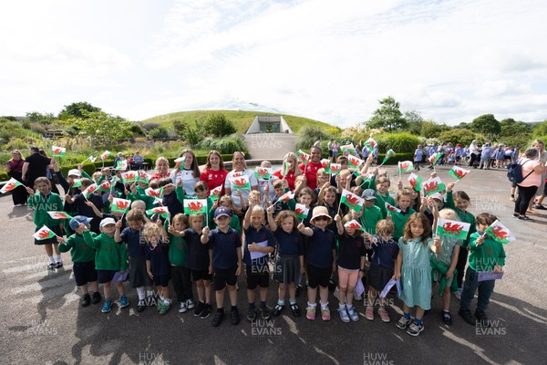 150725 - Wales Women Women’s Rugby World Cup 2025 Kit Launch, National Botanical Gardens of Wales - Wales players, join with schoolchildren at the launch of the Wales Women’s Rugby World Cup kit at the National Botanical Gardens of Wales