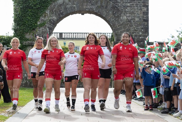 150725 - Wales Women Women’s Rugby World Cup 2025 Kit Launch, National Botanical Gardens of Wales - Wales players, left to right, Molly Reardon, Georgia Evans, Alex Callender, Keira Bevan, Kate Williams, Maisie Davies and Sisilia Tuipulotu at the launch of the Wales Women’s Rugby World Cup kit