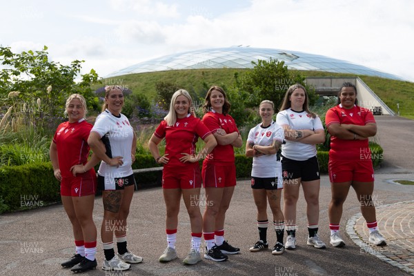 150725 - Wales Women Women’s Rugby World Cup 2025 Kit Launch, National Botanical Gardens of Wales - Wales players, left to right, Molly Reardon, Georgia Evans, Alex Callender, Kate Williams, Keira Bevan, Maisie Davies and Sisilia Tuipulotu at the launch of the Wales Women’s Rugby World Cup kit at the National Botanical Gardens of Wales