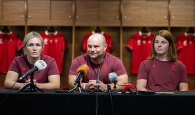 120825 - Wales Women Rugby World Cup Media Conference - Co captains Alex Callendar, left and Kate Williams with Sean Lynn, Wales Women head coach, during a media conference at The Principality Stadium ahead of the Rugby World Cup