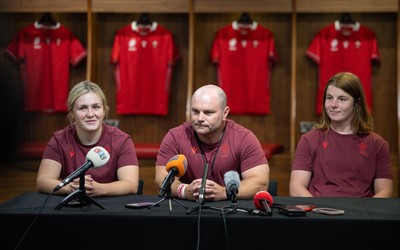120825 - Wales Women Rugby World Cup Media Conference - Co captains Alex Callendar, left and Kate Williams with Sean Lynn, Wales Women head coach, during a media conference at The Principality Stadium ahead of the Rugby World Cup