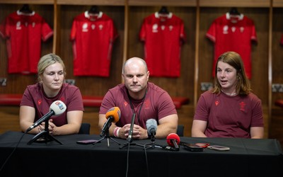 120825 - Wales Women Rugby World Cup Media Conference - Co captains Alex Callendar, left and Kate Williams with Sean Lynn, Wales Women head coach, during a media conference at The Principality Stadium ahead of the Rugby World Cup