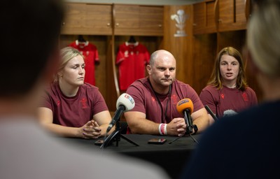120825 - Wales Women Rugby World Cup Media Conference - Co captains Alex Callendar, left and Kate Williams with Sean Lynn, Wales Women head coach, during a media conference at The Principality Stadium ahead of the Rugby World Cup