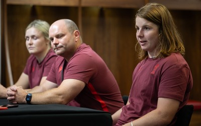 120825 - Wales Women Rugby World Cup Media Conference - Co captains Alex Callendar, left and Kate Williams with Sean Lynn, Wales Women head coach, during a media conference at The Principality Stadium ahead of the Rugby World Cup