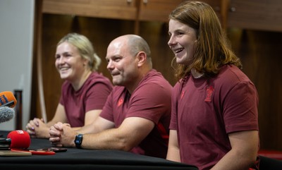 120825 - Wales Women Rugby World Cup Media Conference - Co captains Alex Callendar, left and Kate Williams with Sean Lynn, Wales Women head coach, during a media conference at The Principality Stadium ahead of the Rugby World Cup