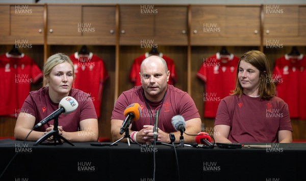 120825 - Wales Women Rugby World Cup Media Conference - Co captains Alex Callendar, left and Kate Williams with Sean Lynn, Wales Women head coach, during a media conference at The Principality Stadium ahead of the Rugby World Cup