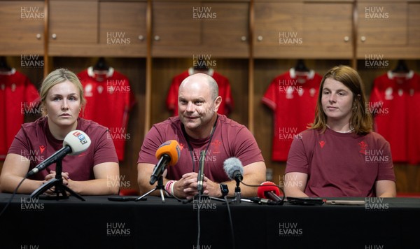 120825 - Wales Women Rugby World Cup Media Conference - Co captains Alex Callendar, left and Kate Williams with Sean Lynn, Wales Women head coach, during a media conference at The Principality Stadium ahead of the Rugby World Cup