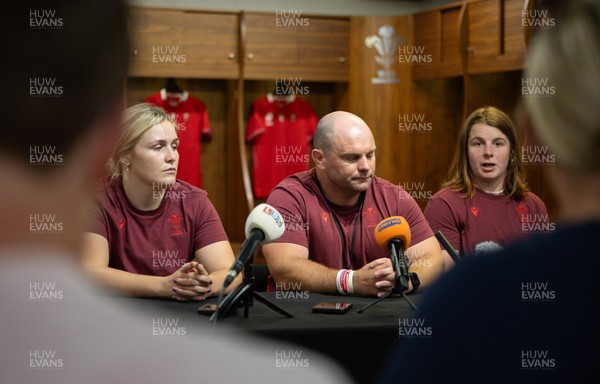 120825 - Wales Women Rugby World Cup Media Conference - Co captains Alex Callendar, left and Kate Williams with Sean Lynn, Wales Women head coach, during a media conference at The Principality Stadium ahead of the Rugby World Cup