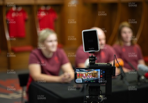 120825 - Wales Women Rugby World Cup Media Conference - Co captains Alex Callendar, left and Kate Williams with Sean Lynn, Wales Women head coach, during a media conference at The Principality Stadium ahead of the Rugby World Cup