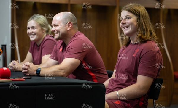 120825 - Wales Women Rugby World Cup Media Conference - Co captains Alex Callendar, left and Kate Williams with Sean Lynn, Wales Women head coach, during a media conference at The Principality Stadium ahead of the Rugby World Cup