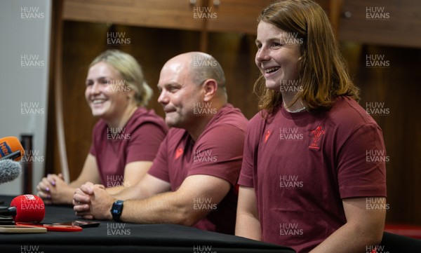 120825 - Wales Women Rugby World Cup Media Conference - Co captains Alex Callendar, left and Kate Williams with Sean Lynn, Wales Women head coach, during a media conference at The Principality Stadium ahead of the Rugby World Cup