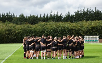 020925 - Wales Women RWC Rugby Training session - The Wales squad huddle up during rugby training session ahead of their final Women’s Rugby World Cup match against Fiji