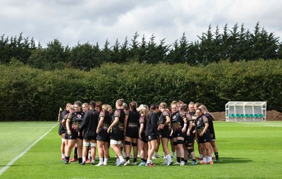 020925 - Wales Women RWC Rugby Training session - The Wales squad huddle up during rugby training session ahead of their final Women’s Rugby World Cup match against Fiji