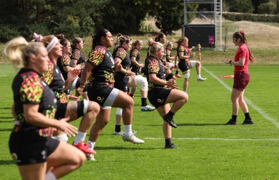 040925 - Wales Women RWC Rugby Training session - The Wales team warm up during a rugby training session ahead of Wales’ final Women’s Rugby World Cup match against Fiji