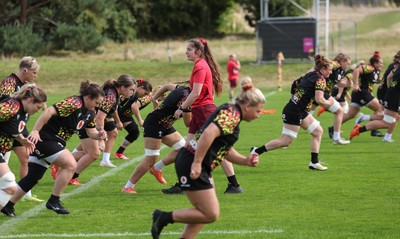 040925 - Wales Women RWC Rugby Training session - The Wales team warm up during a rugby training session ahead of Wales’ final Women’s Rugby World Cup match against Fiji