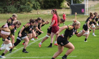 040925 - Wales Women RWC Rugby Training session - The Wales team warm up during a rugby training session ahead of Wales’ final Women’s Rugby World Cup match against Fiji