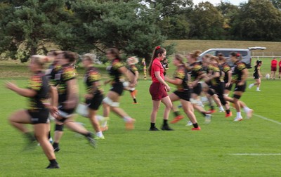 040925 - Wales Women RWC Rugby Training session - The Wales team warm up during a rugby training session ahead of Wales’ final Women’s Rugby World Cup match against Fiji