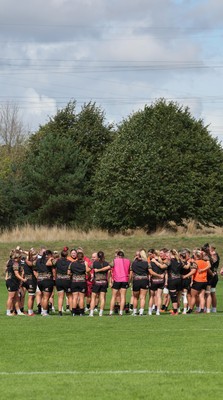 040925 - Wales Women RWC Rugby Training session - The Wales team huddle up during a rugby training session ahead of Wales’ final Women’s Rugby World Cup match against Fiji