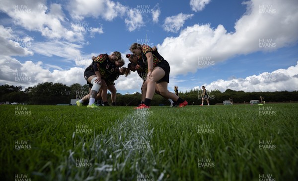 040925 - Wales Women RWC Rugby Training session - Wales warm up ahead of scrummaging during a rugby training session ahead of Wales’ final Women’s Rugby World Cup match against Fiji