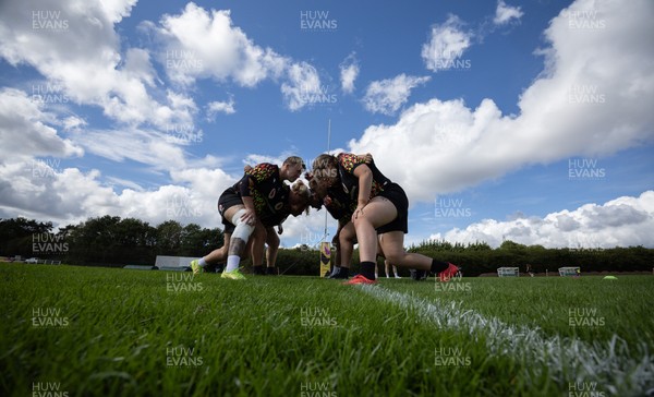 040925 - Wales Women RWC Rugby Training session - Wales warm up ahead of scrummaging during a rugby training session ahead of Wales’ final Women’s Rugby World Cup match against Fiji