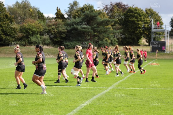 040925 - Wales Women RWC Rugby Training session - The Wales team warm up during a rugby training session ahead of Wales’ final Women’s Rugby World Cup match against Fiji