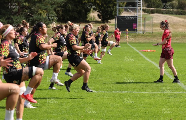 040925 - Wales Women RWC Rugby Training session - The Wales team warm up during a rugby training session ahead of Wales’ final Women’s Rugby World Cup match against Fiji