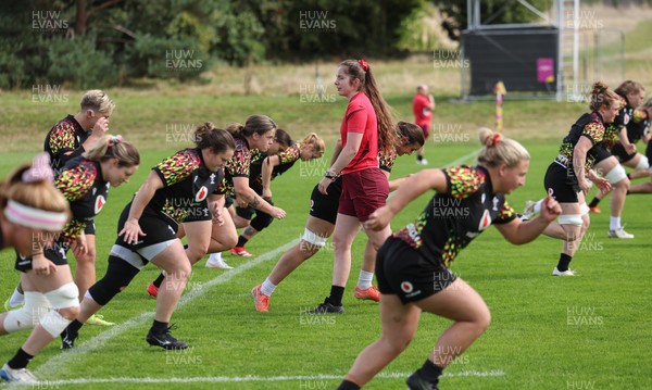 040925 - Wales Women RWC Rugby Training session - The Wales team warm up during a rugby training session ahead of Wales’ final Women’s Rugby World Cup match against Fiji