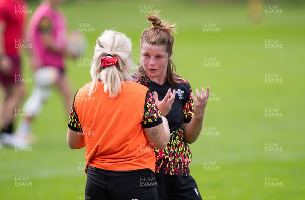 040925 - Wales Women RWC Rugby Training session - Kate Williams with Alex Callender during a rugby training session ahead of Wales’ final Women’s Rugby World Cup match against Fiji