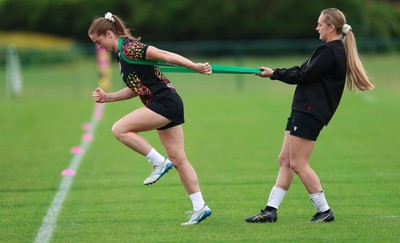 190825 - Wales Women Rugby World Cup Training Session - Lisa Neumann and Hannah Dallavalle during a Wales training session ahead of their first Women’s Rugby World Cup match against Scotland