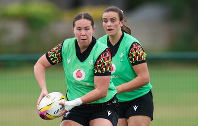 190825 - Wales Women Rugby World Cup Training Session - Katherine Baverstock with Branwen Metcalfe in support during a Wales training session ahead of their first Women’s Rugby World Cup match against Scotland