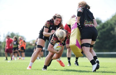 250825 - Wales Women Rugby World Cup Training Session - Branwen Metcalfe, Molly Reardon and Abbie Fleming during a Wales training session ahead of their Women’s Rugby World Cup match against Canada