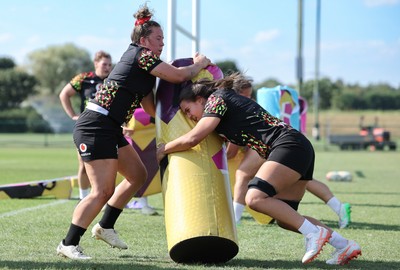 250825 - Wales Women Rugby World Cup Training Session - Katherine Baverstock and Bryonie King during a Wales training session ahead of their Women’s Rugby World Cup match against Canada