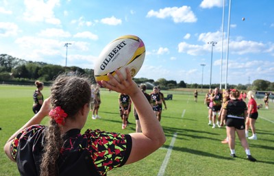 250825 - Wales Women Rugby World Cup Training Session - Carys Phillips prepares a line out throw during a Wales training session ahead of their Women’s Rugby World Cup match against Canada