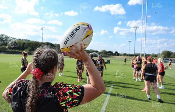 250825 - Wales Women Rugby World Cup Training Session - Carys Phillips prepares a line out throw during a Wales training session ahead of their Women’s Rugby World Cup match against Canada