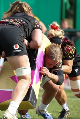 260825 - Wales Women Rugby World Cup Training Session - Tilly Vucaj powers through during a Wales training session ahead of their Women’s Rugby World Cup match against Canada