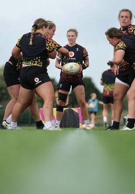 260825 - Wales Women Rugby World Cup Training Session - Keira Bevan looks on as the Wales pack scrum down during a Wales training session ahead of their Women’s Rugby World Cup match against Canada
