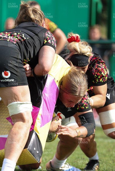 260825 - Wales Women Rugby World Cup Training Session - Tilly Vucaj powers through during a Wales training session ahead of their Women’s Rugby World Cup match against Canada