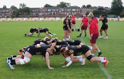 280825 - Wales Women Rugby World Cup Training Session - Wales run through scrummaging training during a Wales rugby training session ahead of their Women’s Rugby World Cup match against Canada