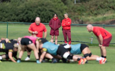 280825 - Wales Women Rugby World Cup Training Session - Dr Gwennan Williams, Wales Women team doctor and Jo Perkins, physio, look on during a Wales rugby training session ahead of their Women’s Rugby World Cup match against Canada