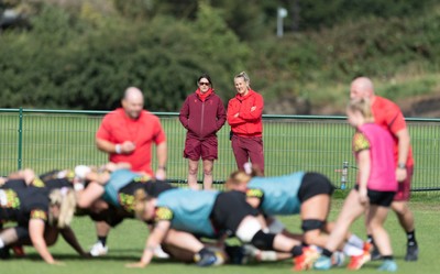 280825 - Wales Women Rugby World Cup Training Session - Dr Gwennan Williams, Wales Women team doctor and Jo Perkins, physio, look on during a Wales rugby training session ahead of their Women’s Rugby World Cup match against Canada