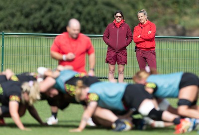 280825 - Wales Women Rugby World Cup Training Session - Dr Gwennan Williams, Wales Women team doctor and Jo Perkins, physio, look on during a Wales rugby training session ahead of their Women’s Rugby World Cup match against Canada